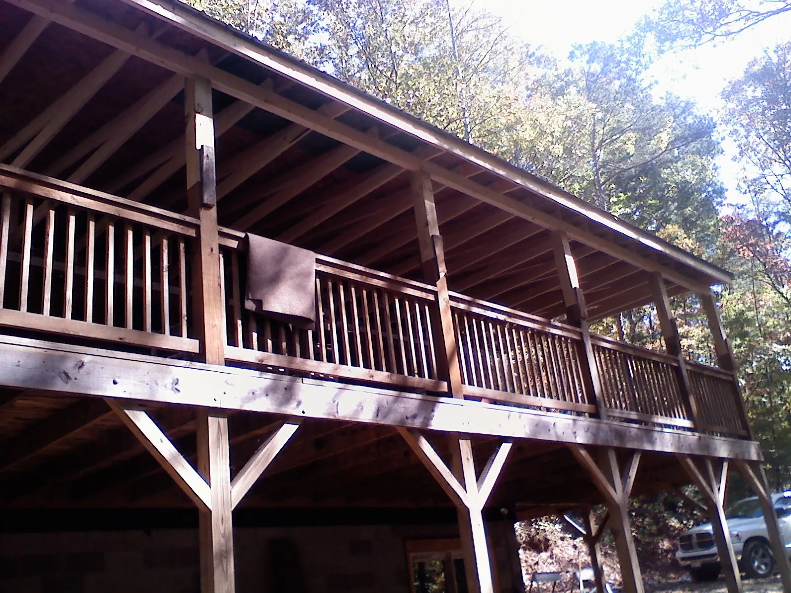 Timber framing under a new elevated porch and deck — Roof Leak Repair in Cowansville by Roofing Brothers